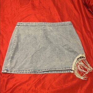Chic Denim Mini Skirt with Fringe Accent